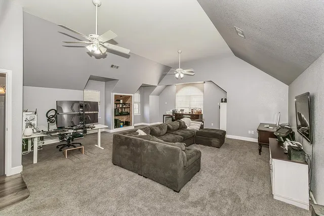 a view of a backyard with sitting area and furniture