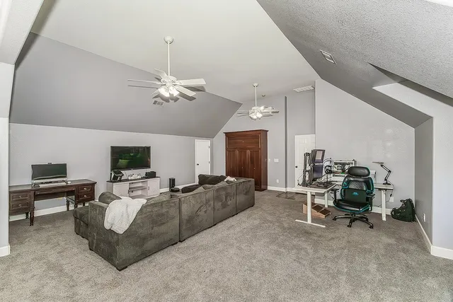 a outdoor space with patio the couches and a dining table with the view of the house