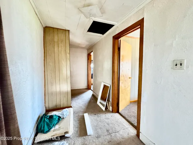 a bathroom with a sink mirror and a bathtub