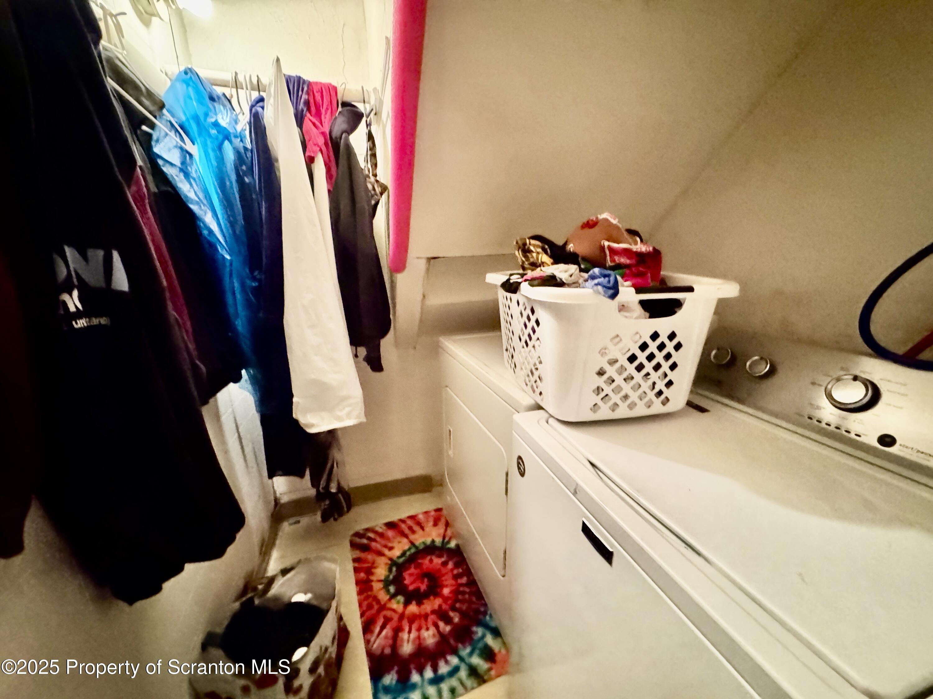 1430 North Main Avenue Scranton, PA 18508 - Photo 16 of 31 a view of walk in closet with clothes and shoes