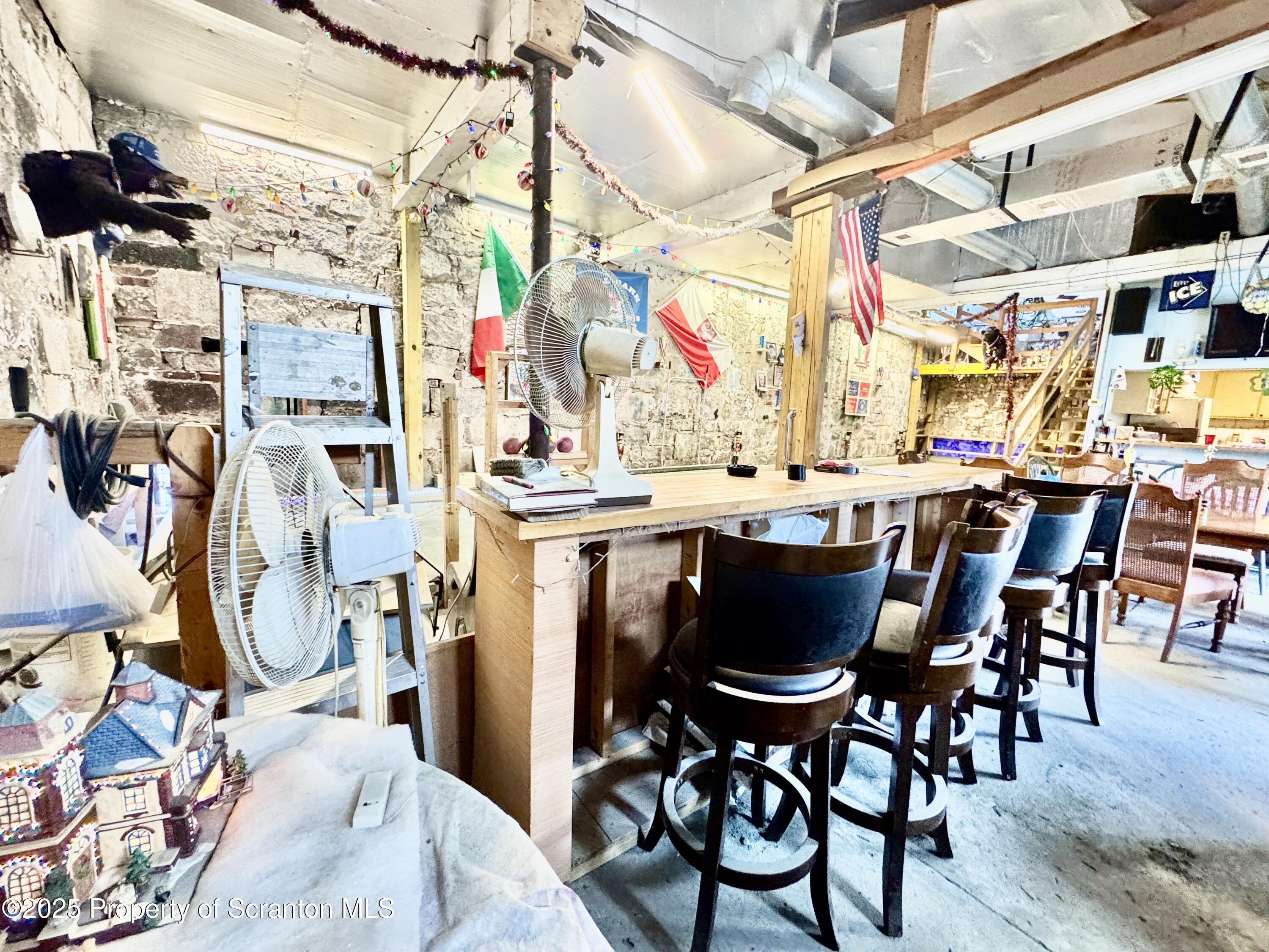 1430 North Main Avenue Scranton, PA 18508 - Photo 27 of 31 a view of a dining room with furniture and a chandelier