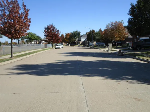 a view of street with houses