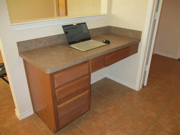 a bathroom with a sink and vanity