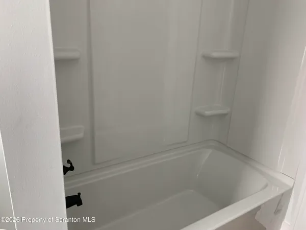 a close up of a bathtub