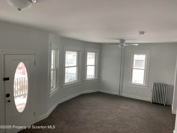 an empty room with windows