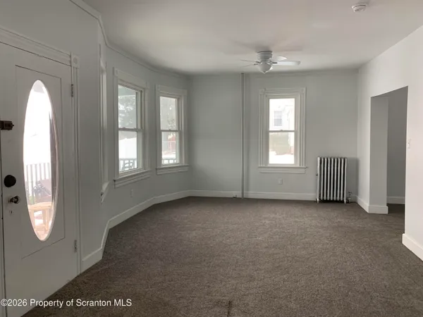 an empty room with windows