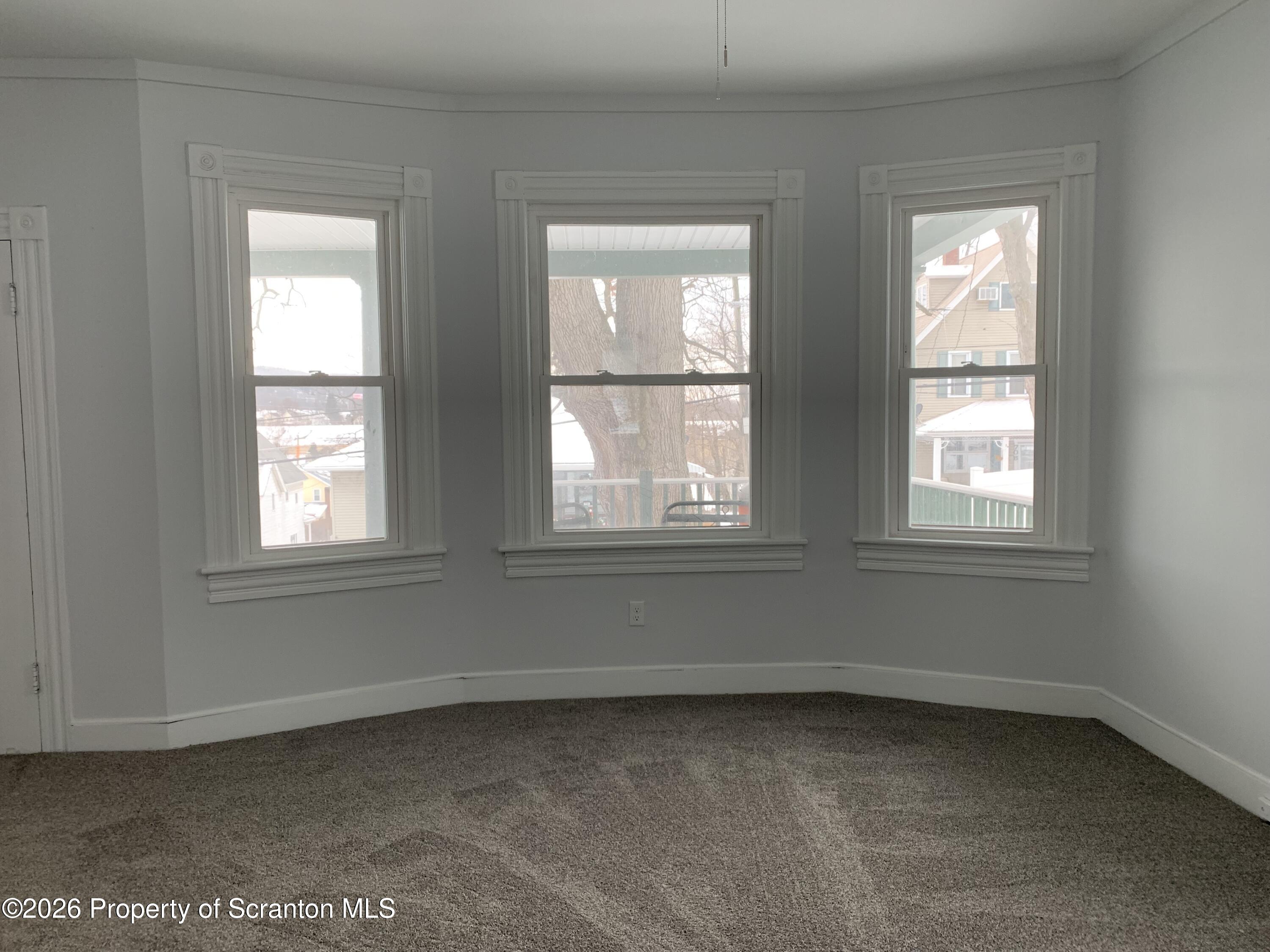 709 Meade Street Dunmore, PA 18512 - Photo 15 of 38 an empty room with a window
