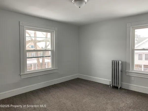 an empty room with a window