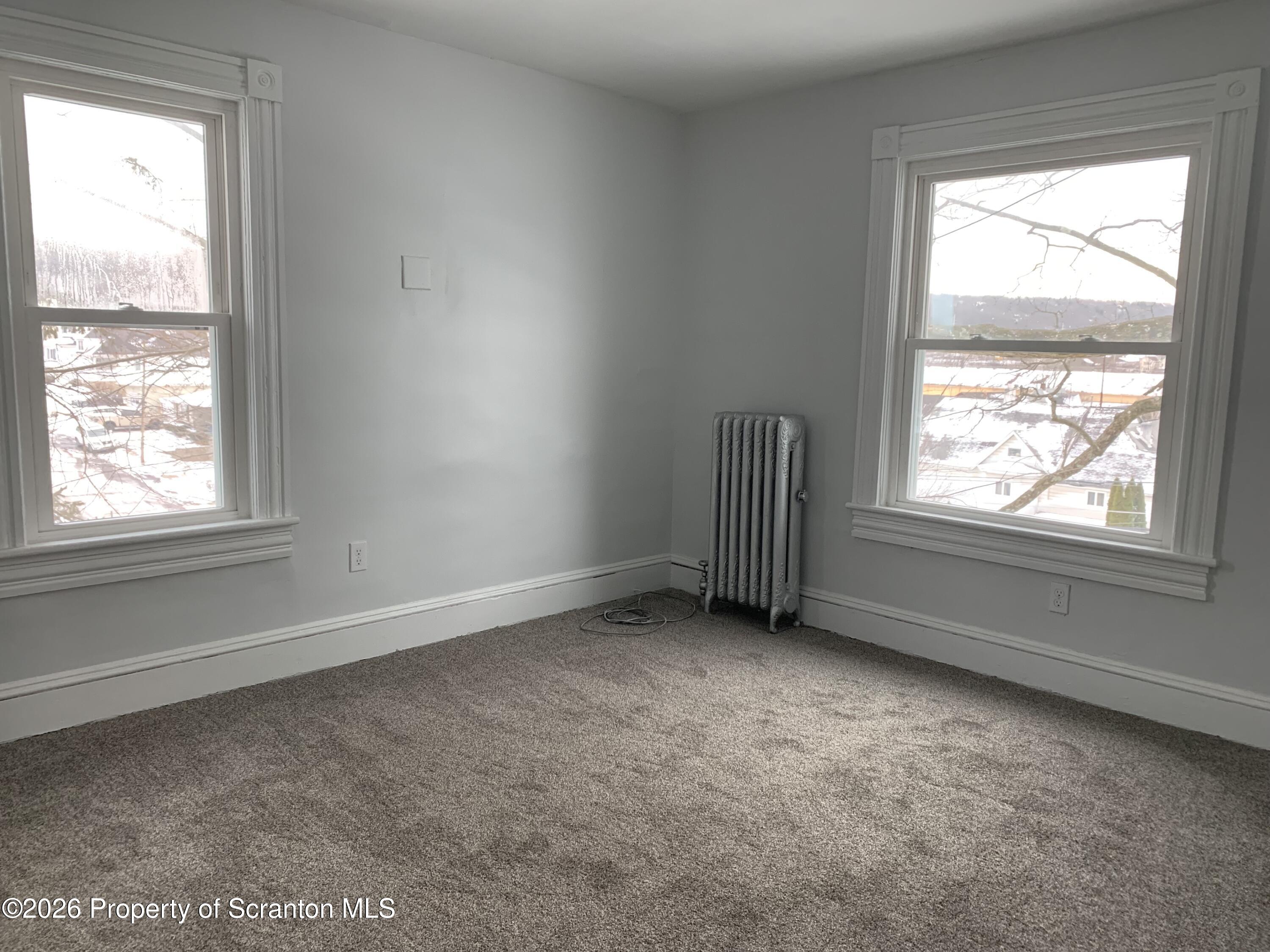 709 Meade Street Dunmore, PA 18512 - Photo 20 of 38 an empty room with a window