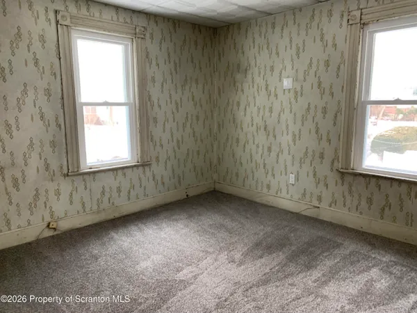 an empty room with a window