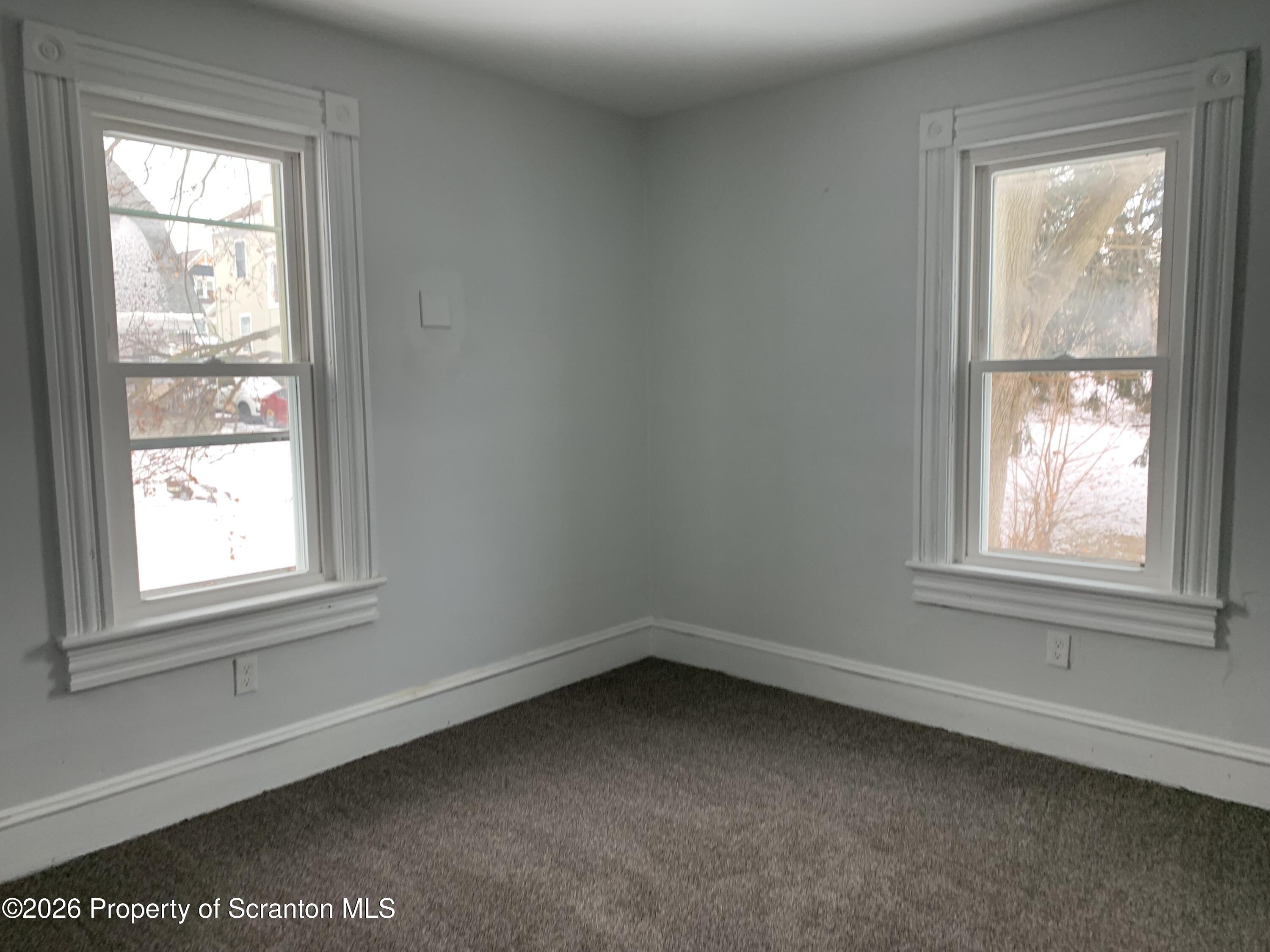 709 Meade Street Dunmore, PA 18512 - Photo 22 of 38 an empty room with a window