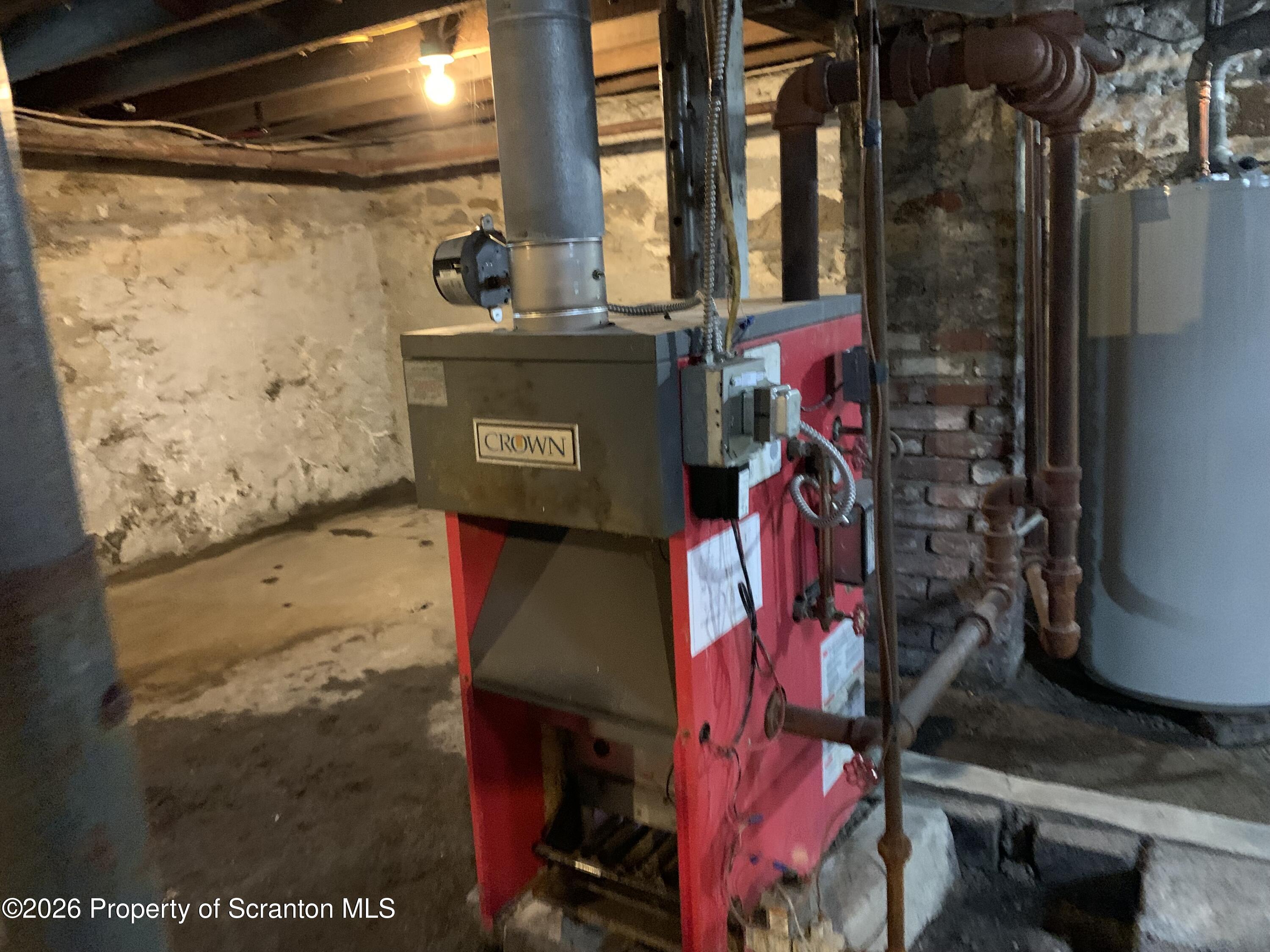 709 Meade Street Dunmore, PA 18512 - Photo 32 of 38 a view of water heater room