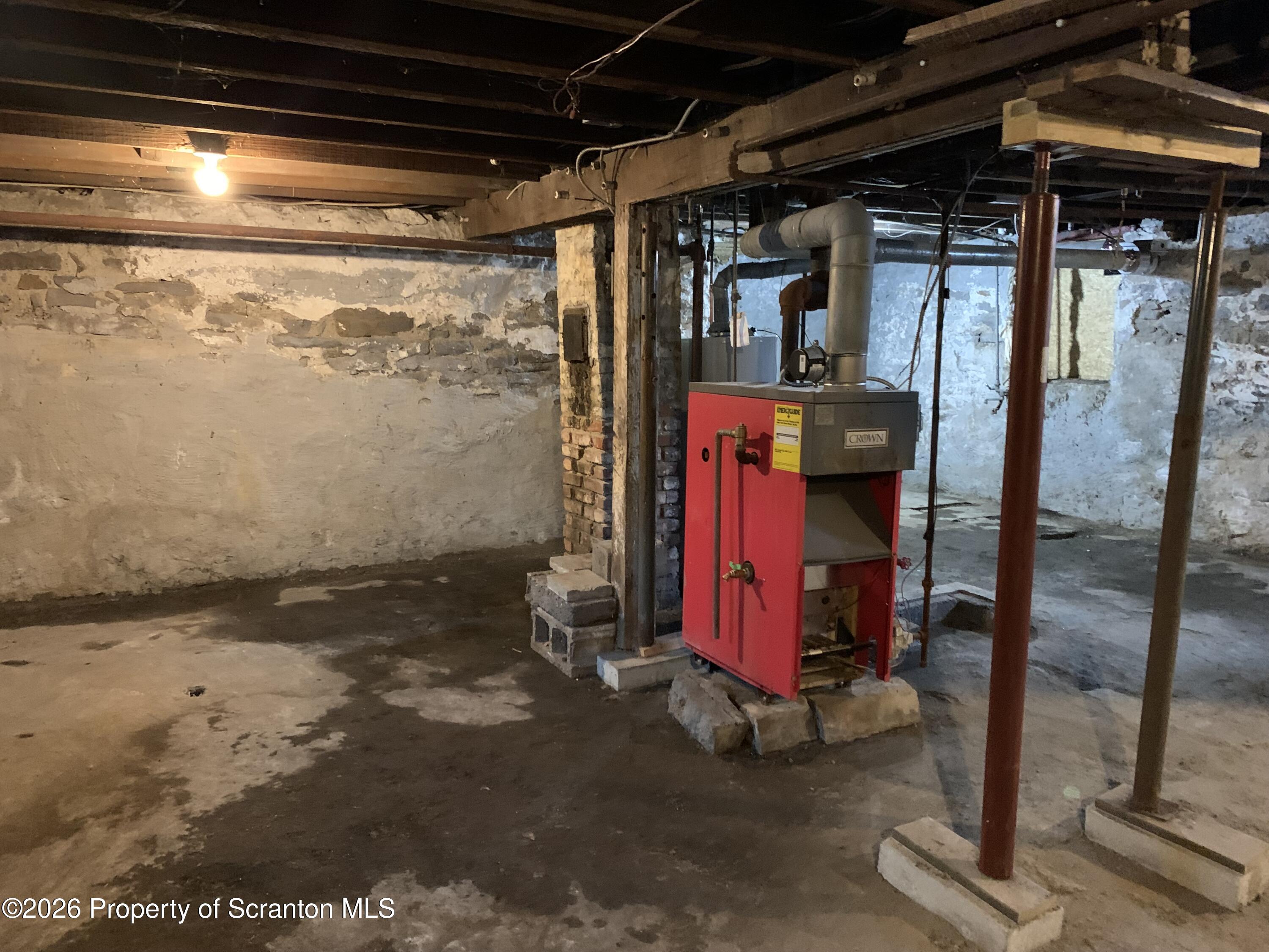 709 Meade Street Dunmore, PA 18512 - Photo 34 of 38 a view of water heater room