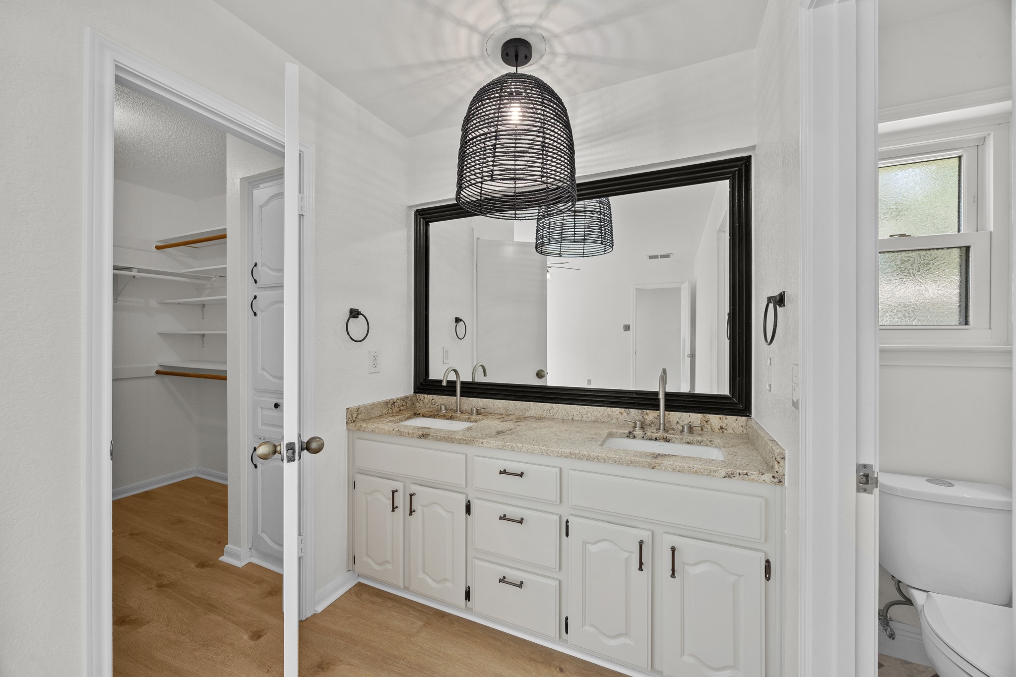 11019 Southwest Oaks Austin, TX 78737 - Photo 20 of 39 The primary suite is complete with a walk-in closet.