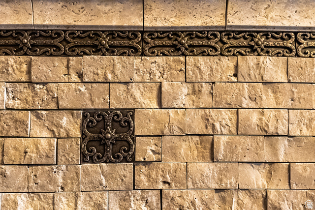 694 West Cephus Road Draper, UT 84020 - Photo 123 of 148 Textured stone wall featuring decorative metal accents