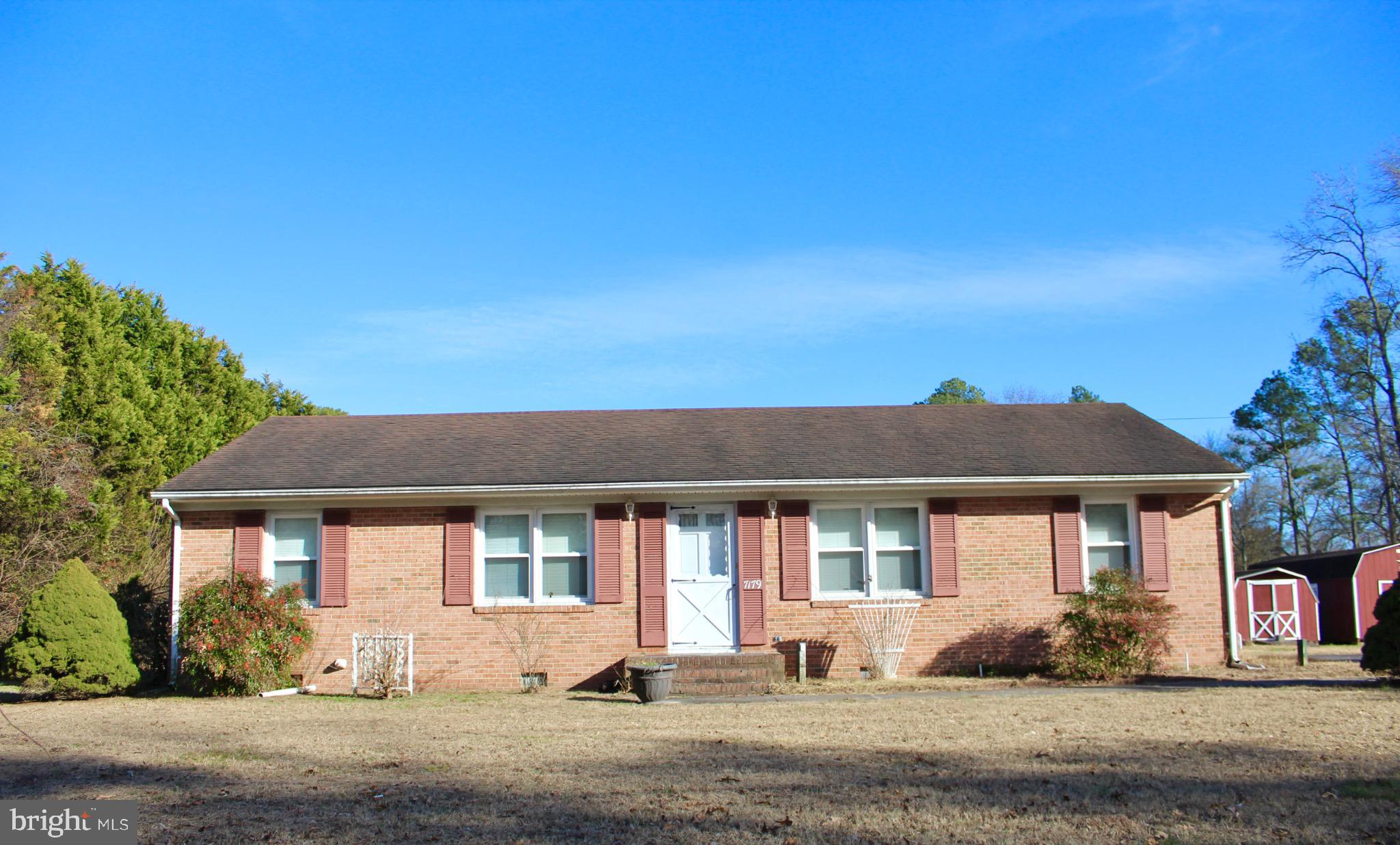 Charming brick home with inviting curb appeal.