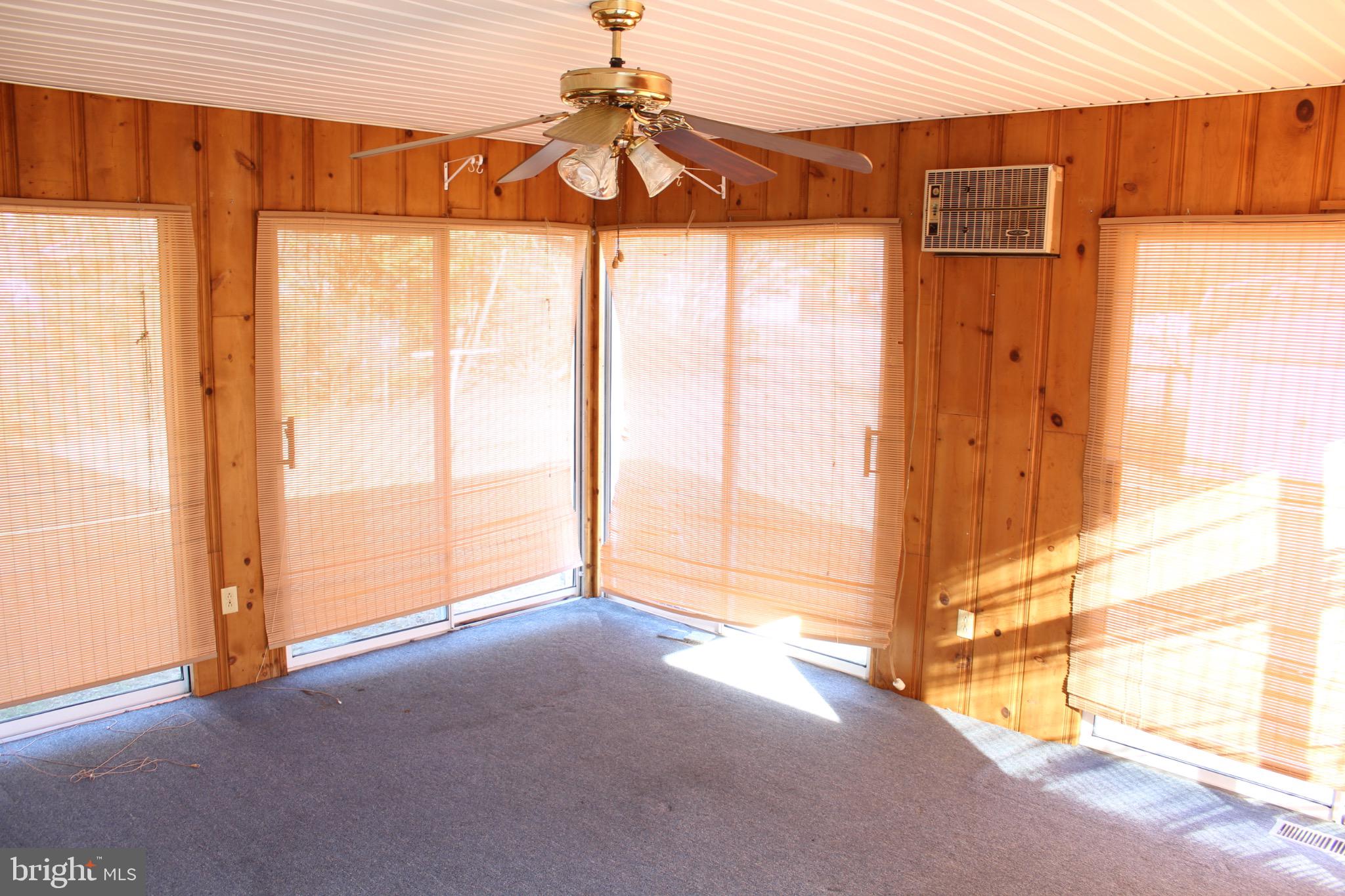7179 Walston Switch Road Parsonsburg, MD 21849 - Photo 13 of 32 Sunlit retreat with warm wooden accents.