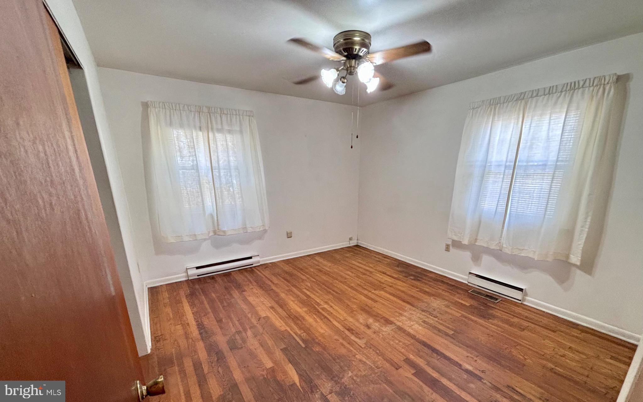 7179 Walston Switch Road Parsonsburg, MD 21849 - Photo 19 of 32 Bright and airy room with wooden floors.