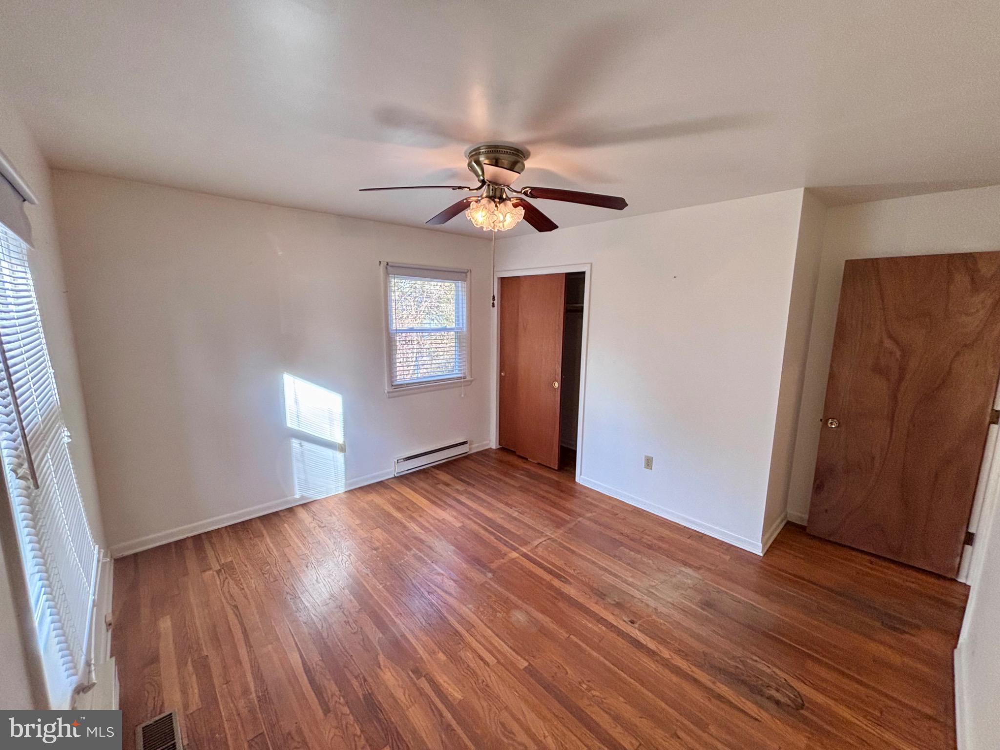 7179 Walston Switch Road Parsonsburg, MD 21849 - Photo 21 of 32 Bright and airy room with hardwood floors.