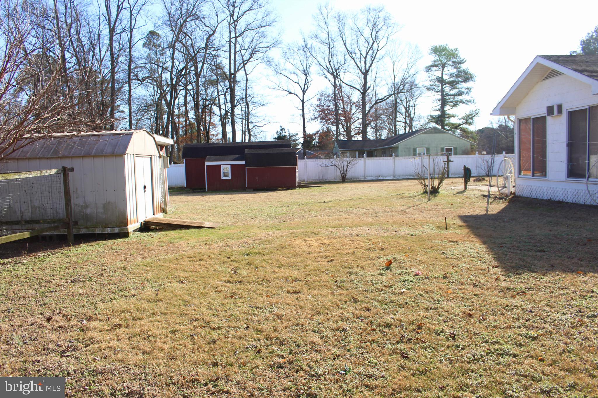 7179 Walston Switch Road Parsonsburg, MD 21849 - Photo 29 of 32 Spacious backyard with charming outbuildings.