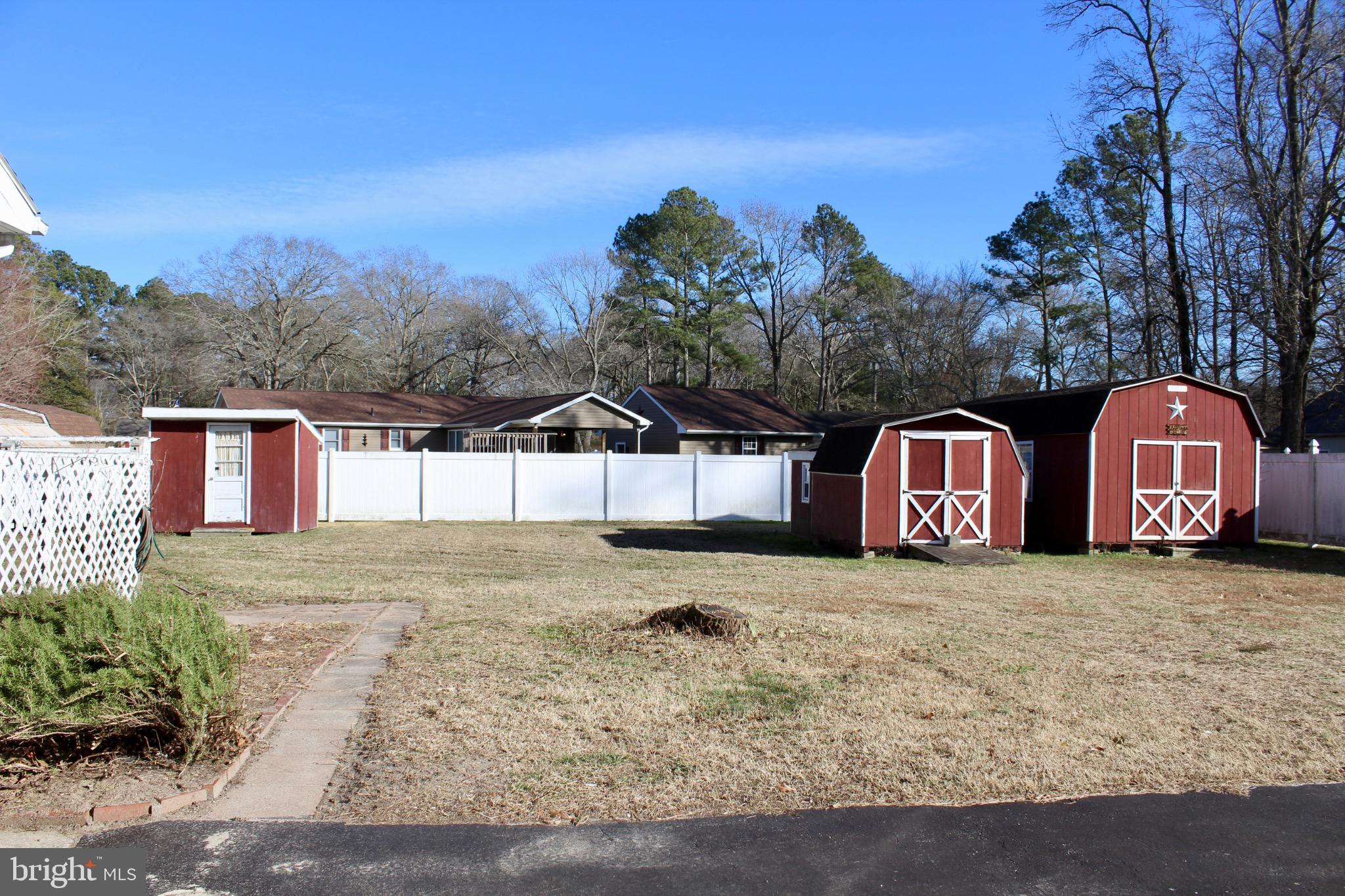 7179 Walston Switch Road Parsonsburg, MD 21849 - Photo 3 of 32 Spacious yard with charming storage sheds.