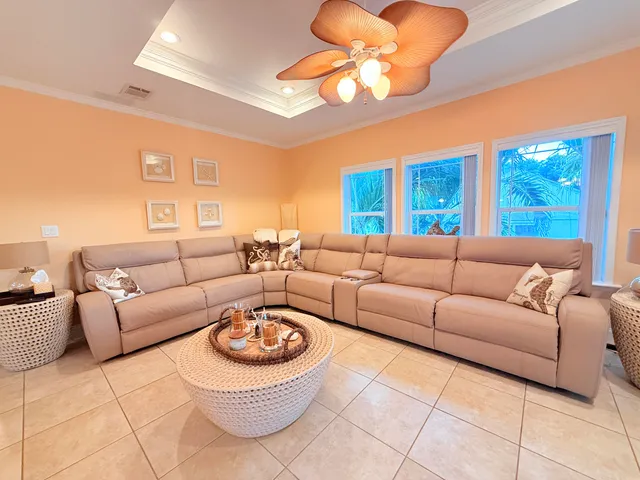 a large kitchen with a table and chairs