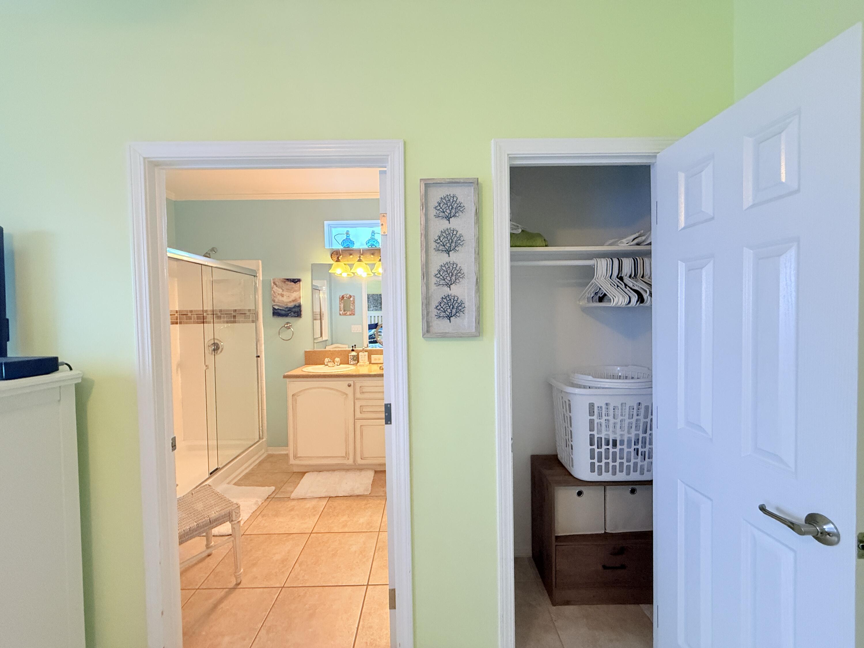 903 Tropical Lane Key Largo, FL 33037 - Photo 19 of 46 a bathroom with a sink and a mirror
