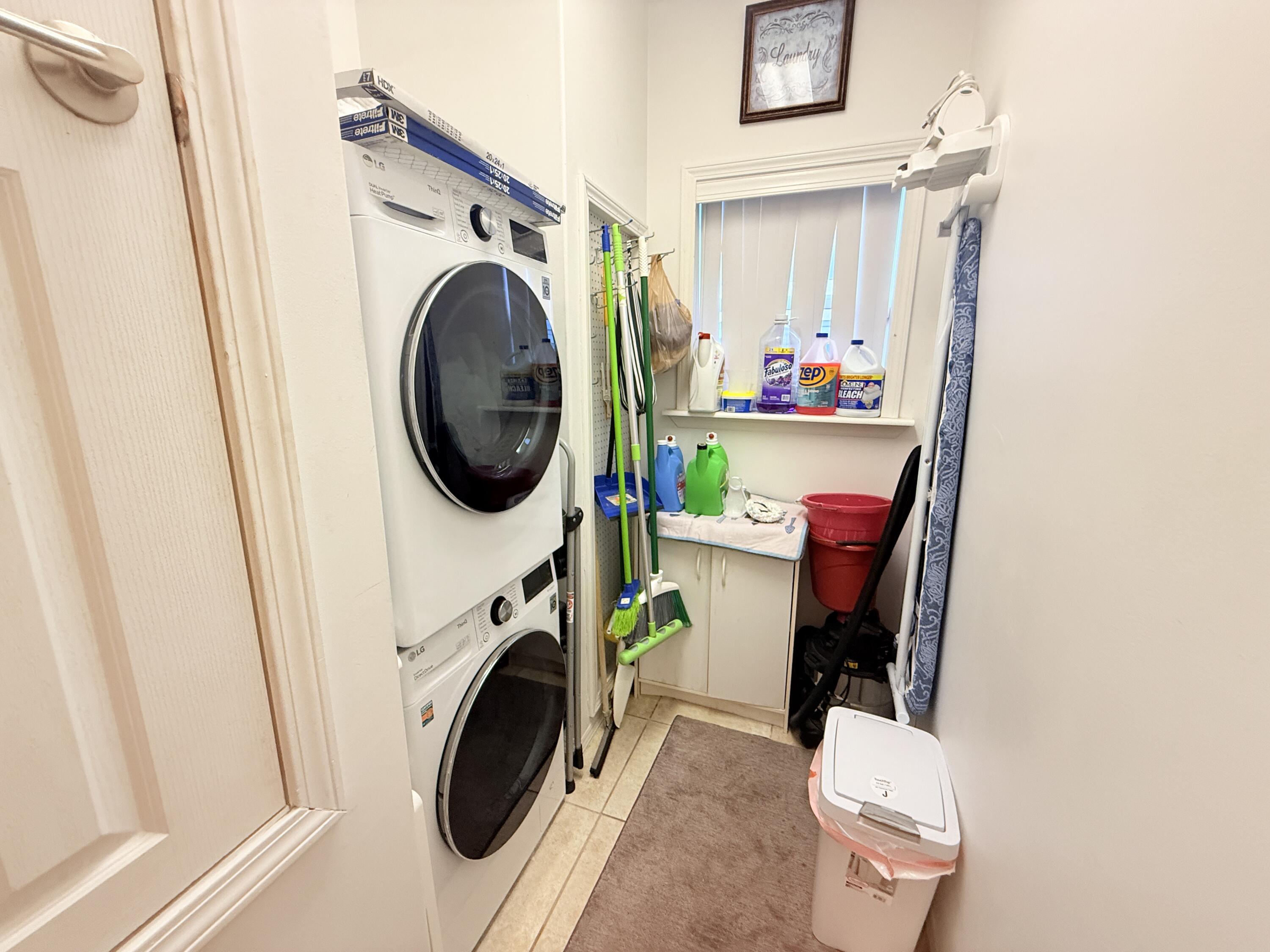 903 Tropical Lane Key Largo, FL 33037 - Photo 27 of 46 a utility room with dryer and washer