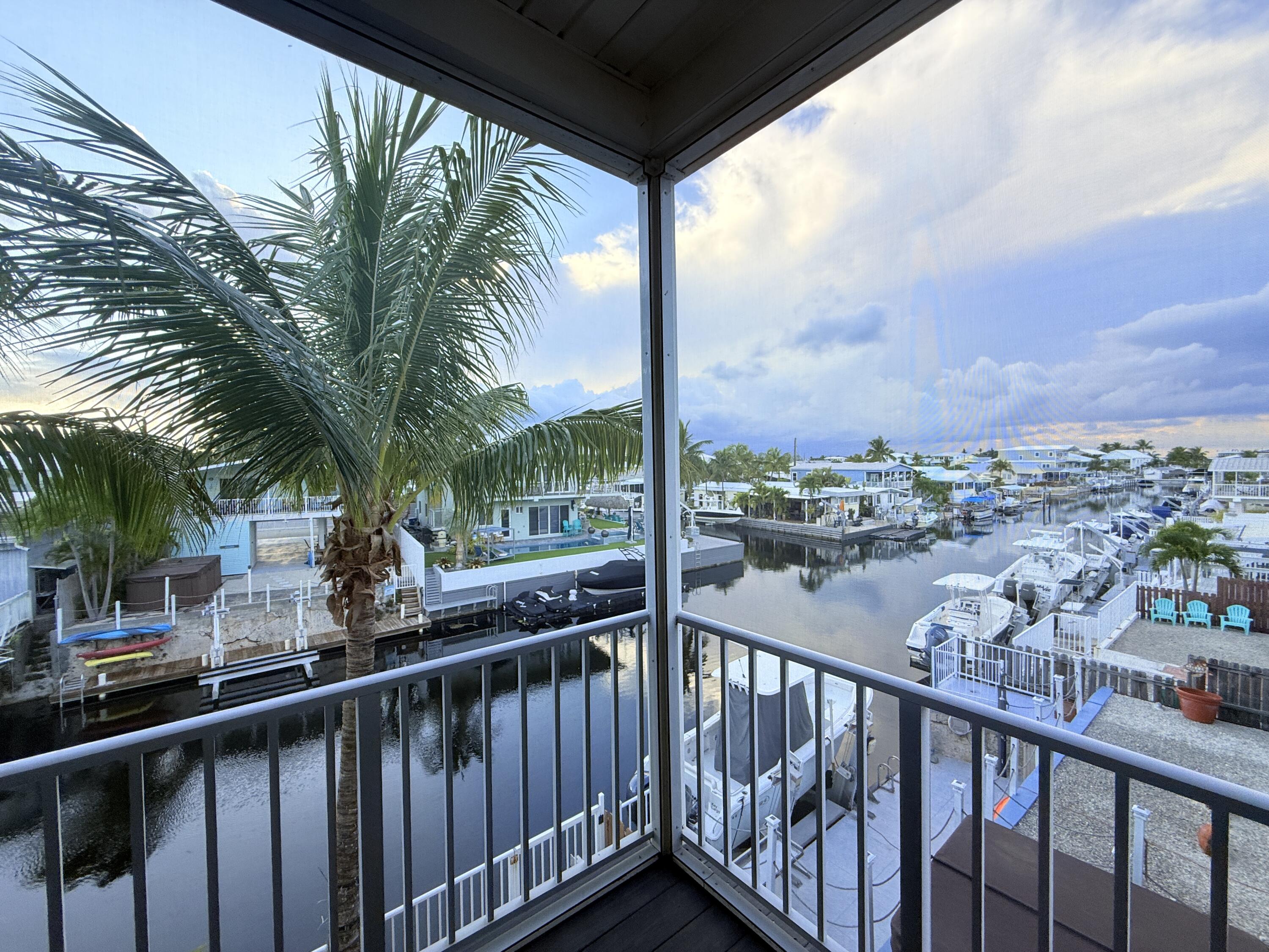 903 Tropical Lane Key Largo, FL 33037 - Photo 29 of 46 a view of city from a balcony