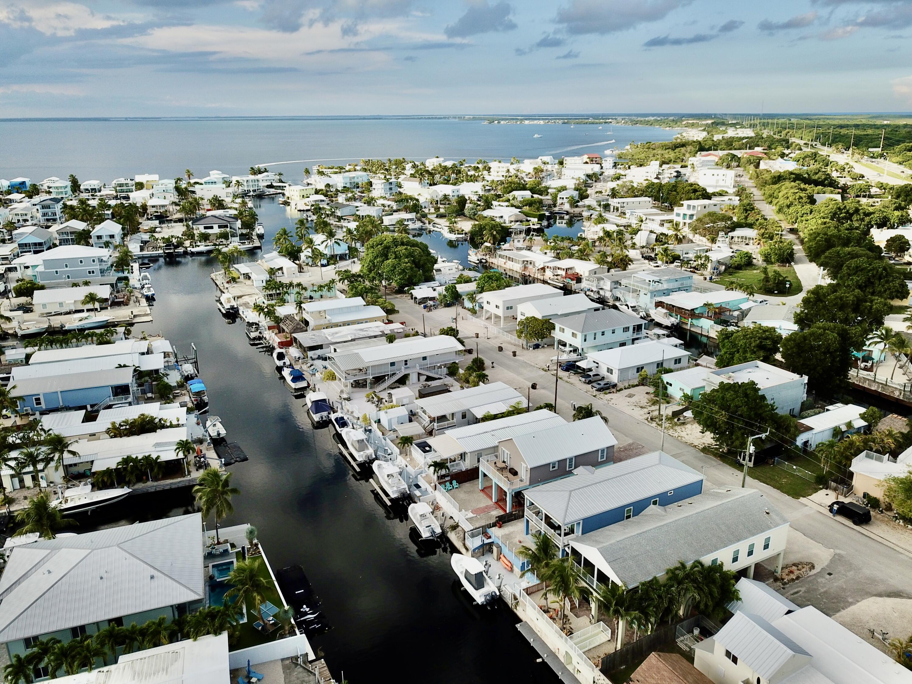 903 Tropical Lane Key Largo, FL 33037 - Photo 3 of 46 an aerial view of residential building and parking space