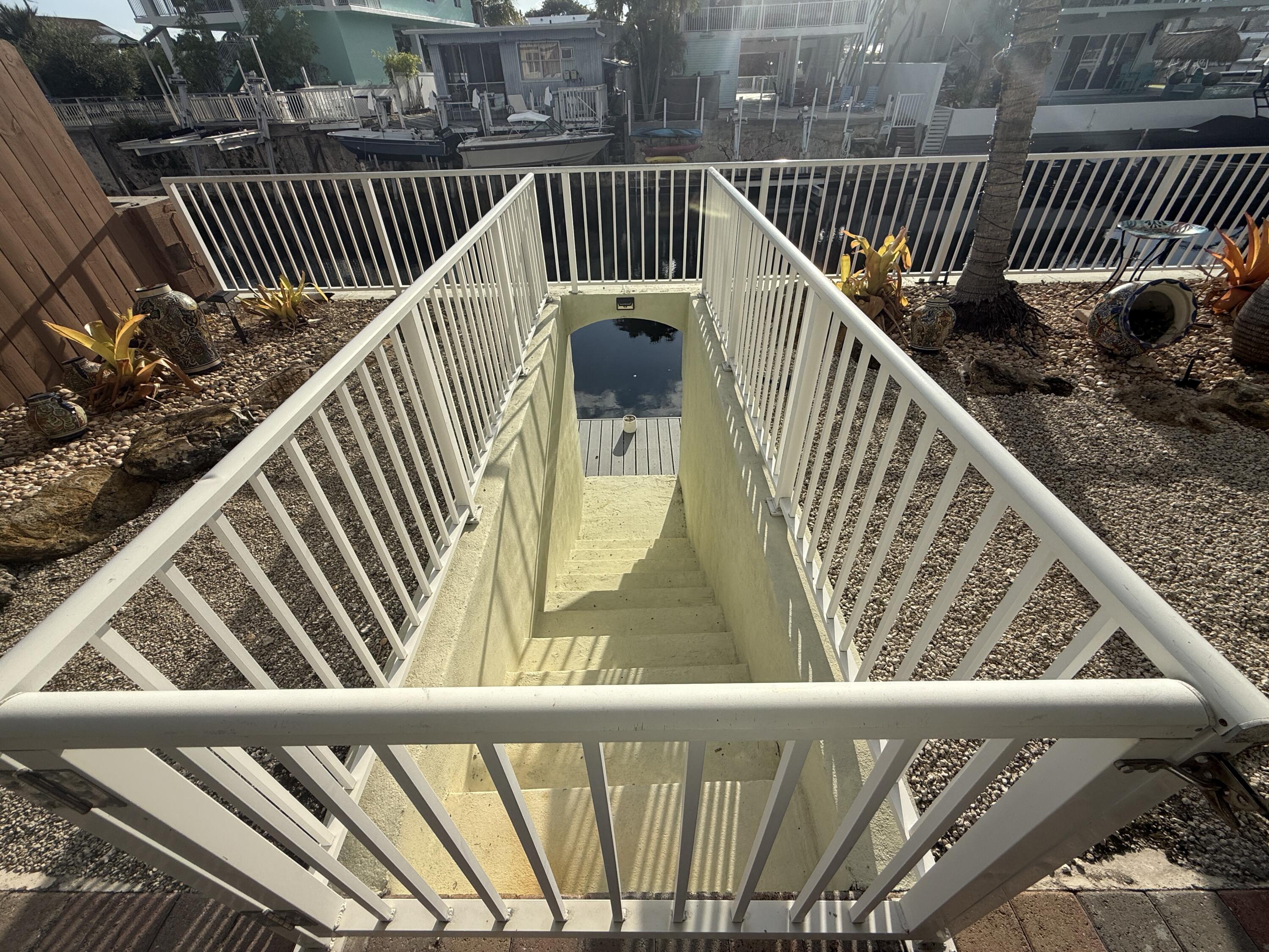903 Tropical Lane Key Largo, FL 33037 - Photo 39 of 46 a view of deck with a floor and fence
