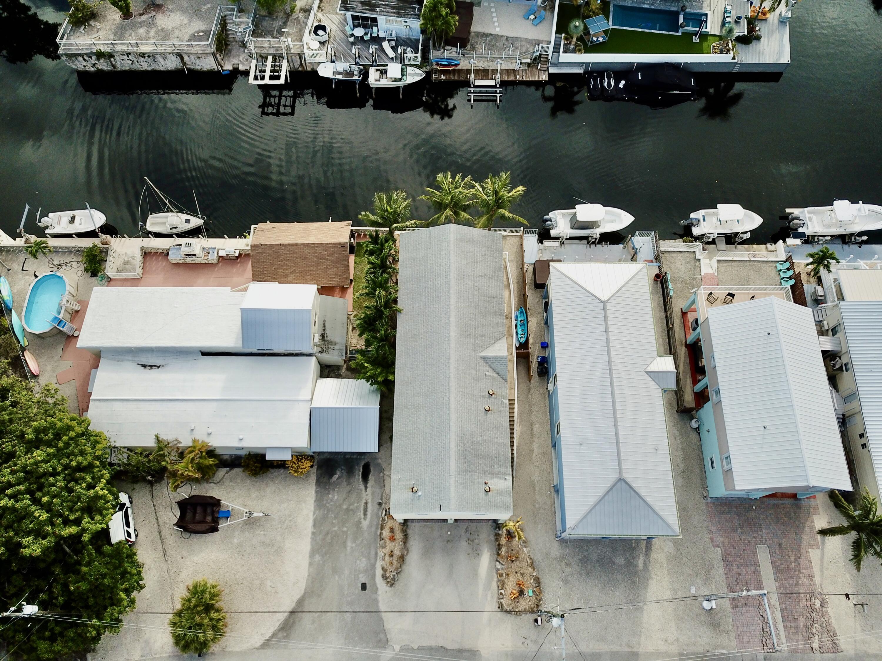 903 Tropical Lane Key Largo, FL 33037 - Photo 44 of 46 an aerial view of a house with a lake view
