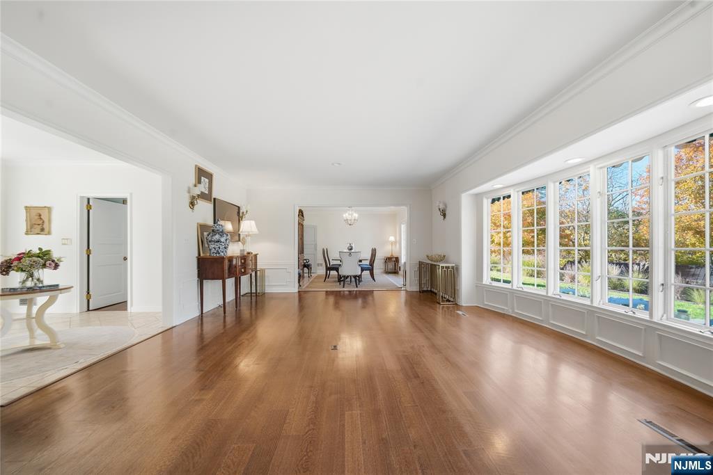 18 Pepperidge Tree Terrace Butler, NJ 07405 - Photo 11 of 35 a view of a living room with furniture and wooden floor