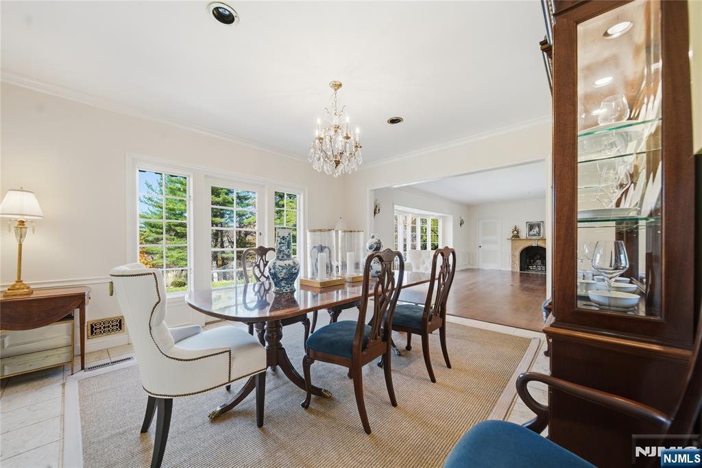 18 Pepperidge Tree Terrace Butler, NJ 07405 - Photo 13 of 35 a view of a dining room with furniture window and outside view