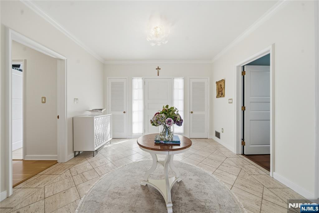 18 Pepperidge Tree Terrace Butler, NJ 07405 - Photo 15 of 35 a living room with furniture and a potted plant