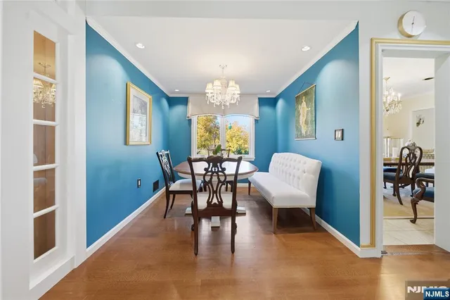 a view of a living room and kitchen view