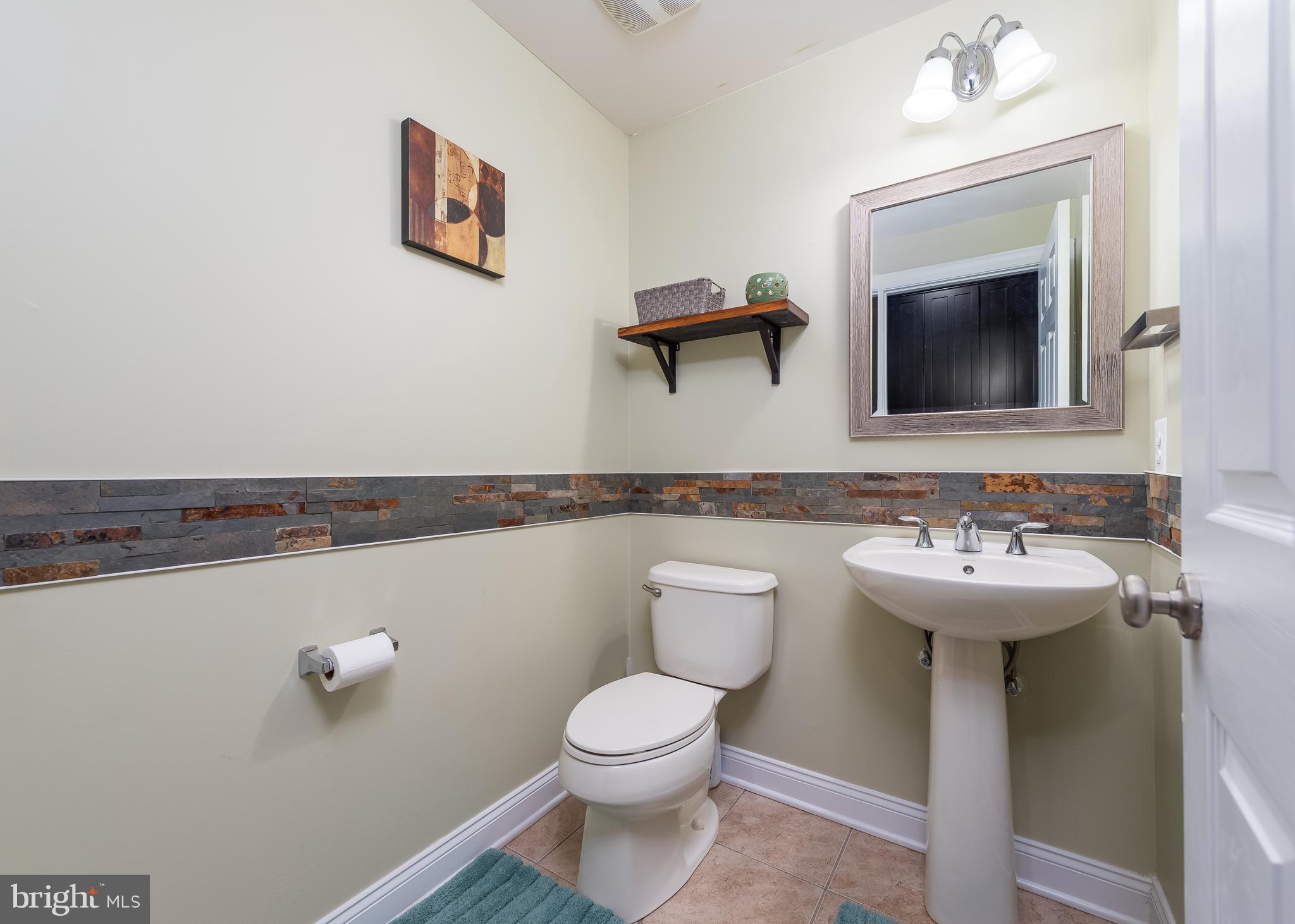 7665 Elmcrest Road Hanover, MD 21076 - Photo 12 of 37 Stylish main level guest powder room