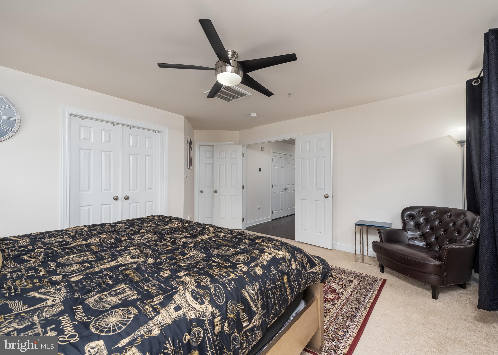7665 Elmcrest Road Hanover, MD 21076 - Photo 16 of 37 Spacious primary bedroom with ceiling fan