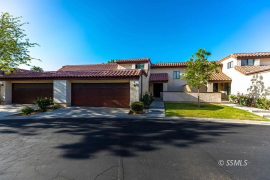 420 Montefino Drive Ridgecrest, CA 93555 - Photo 2 of 38 a view of a house with swimming pool and sitting area