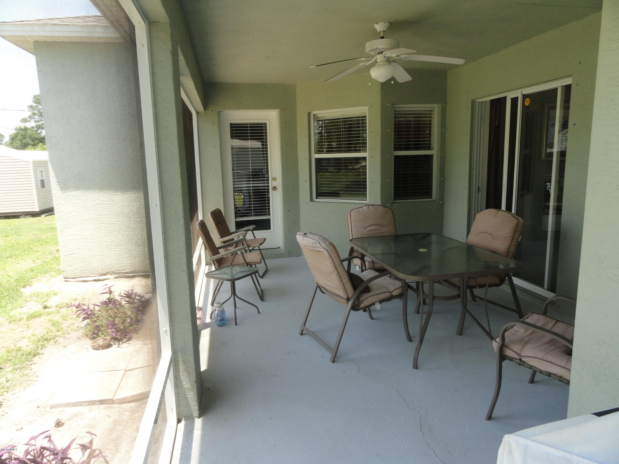 308 Taunton Road Southwest Palm Bay, FL 32908 - Photo 12 of 13 SCREEBED PORCH
