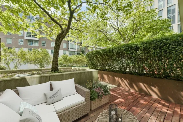 a view of a couches in a back yard