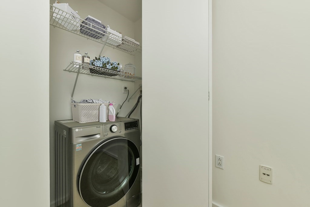 2 Earhart Street, Unit 120 Cambridge, MA 02141 - Photo 21 of 42 a utility room with dryer and washer