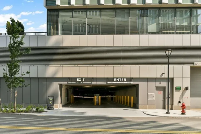 a view of a brick house with a large windows