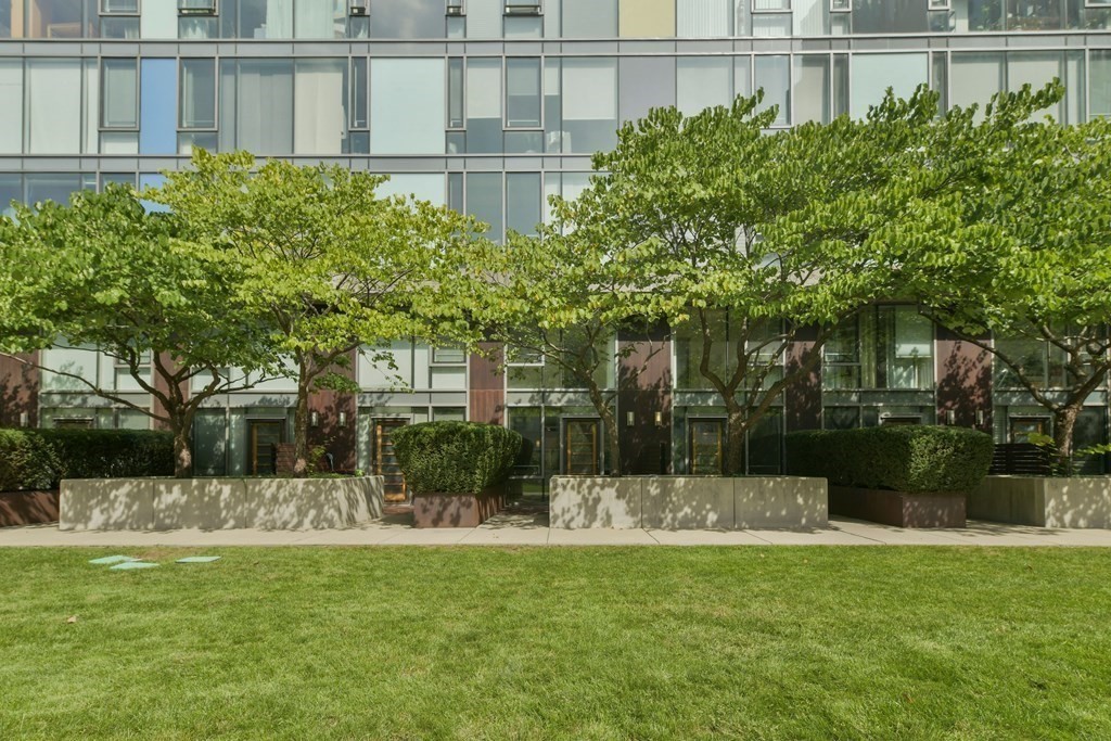 2 Earhart Street, Unit 120 Cambridge, MA 02141 - Photo 25 of 42 a view of a house with a yard