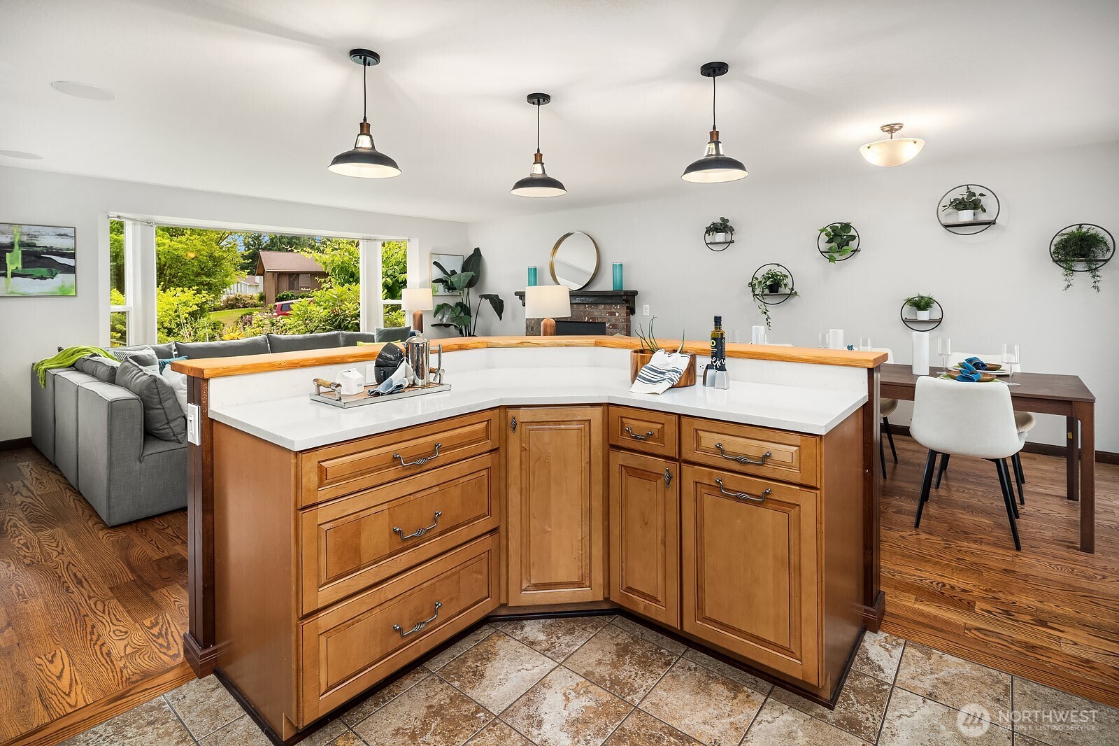 409 169th Street Southeast Bothell, WA 98012 - Photo 11 of 31 a kitchen with a sink stove and cabinets