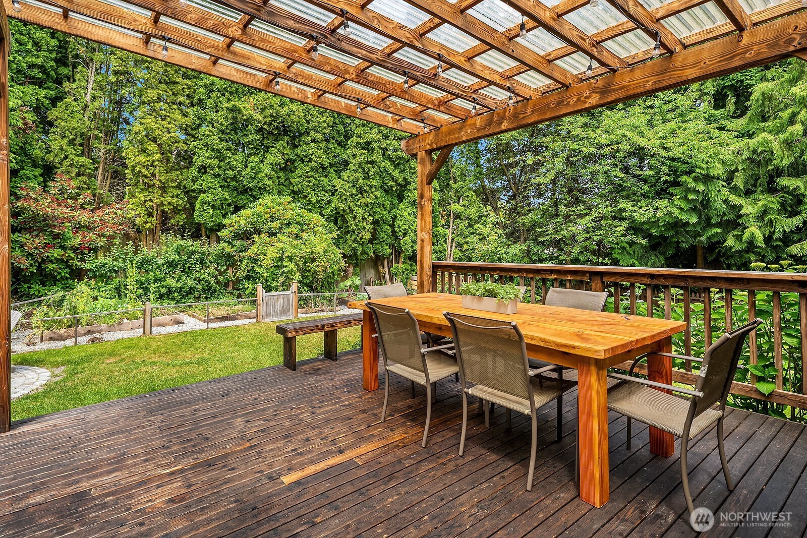 409 169th Street Southeast Bothell, WA 98012 - Photo 24 of 31 a view of a chairs and table on the deck