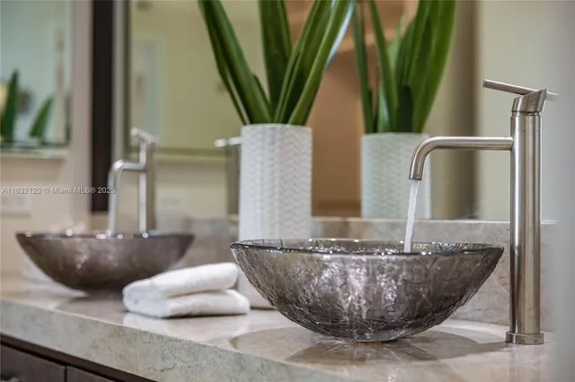 a view of a sink and a mirror