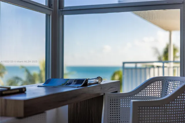 a view of balcony with furniture