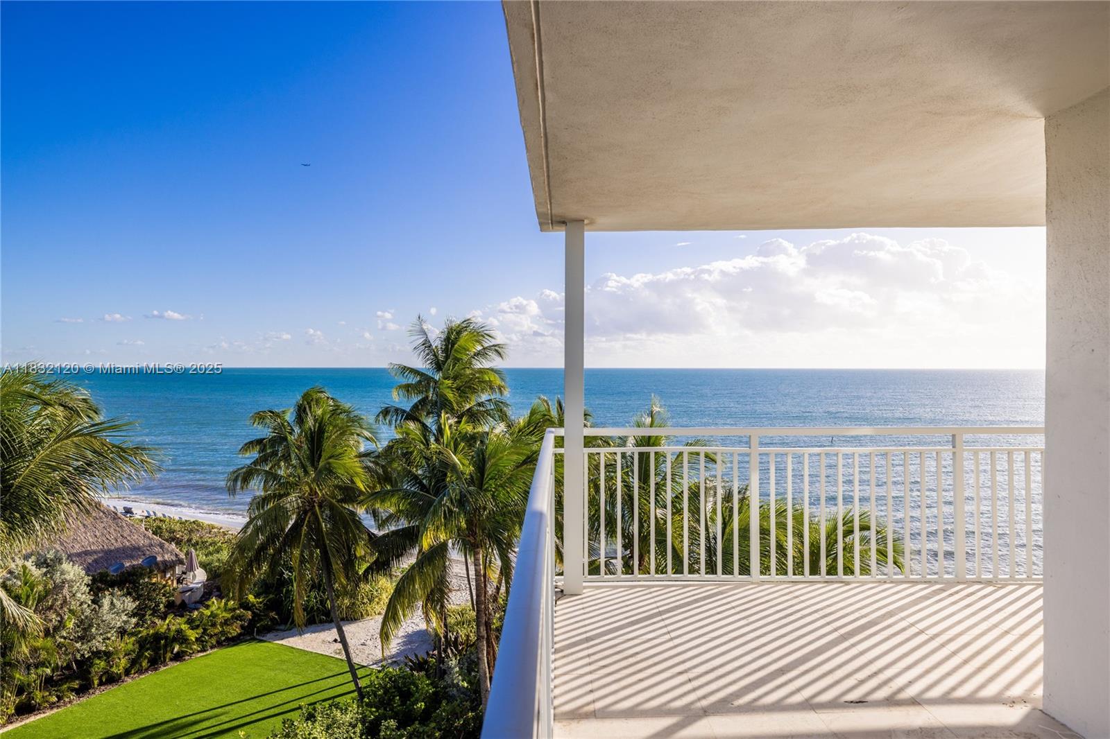 615 Ocean Drive, Unit 6A Key Biscayne, FL 33149 - Photo 28 of 40 a view of a balcony with ocean view