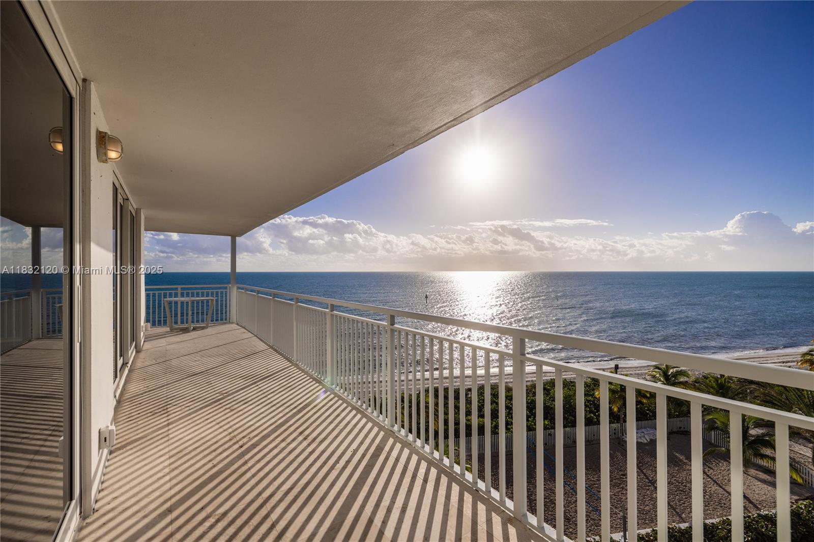 615 Ocean Drive, Unit 6A Key Biscayne, FL 33149 - Photo 29 of 40 a view of balcony with wooden floor
